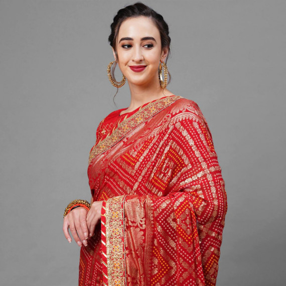 https://shop-ally.in/products/red-gold-toned-woven-design-bandhani-saree